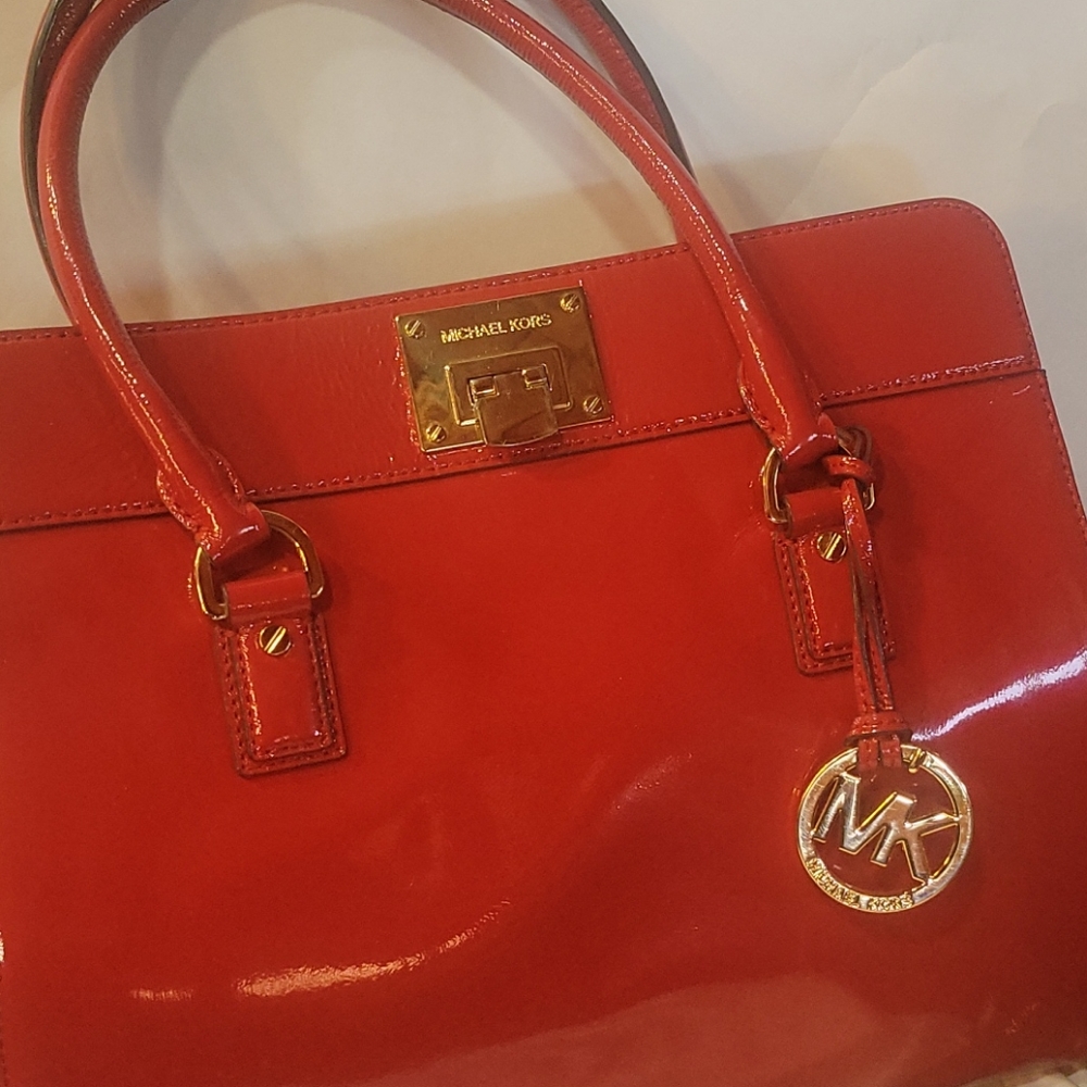 Red Michael Kors bag.